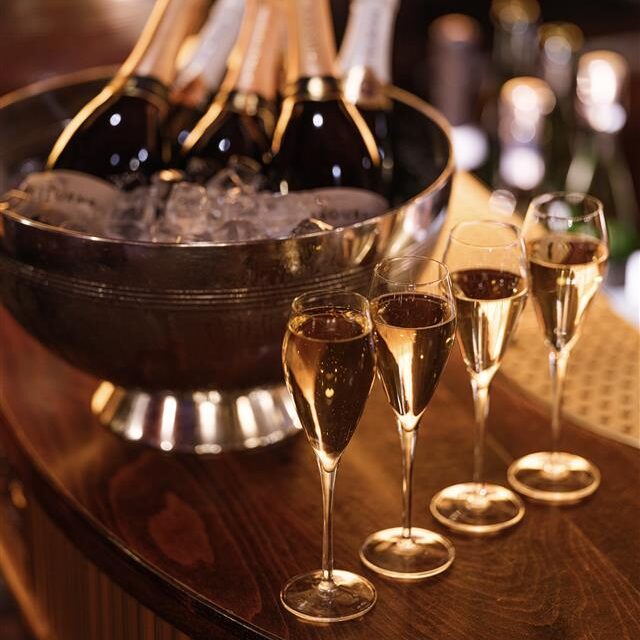 Champagne on ice with flutes